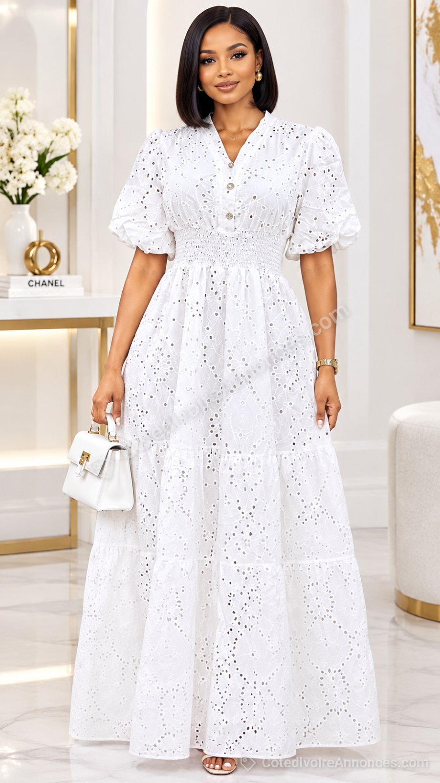Robe longue blanche en broderie anglaise à Abidjan